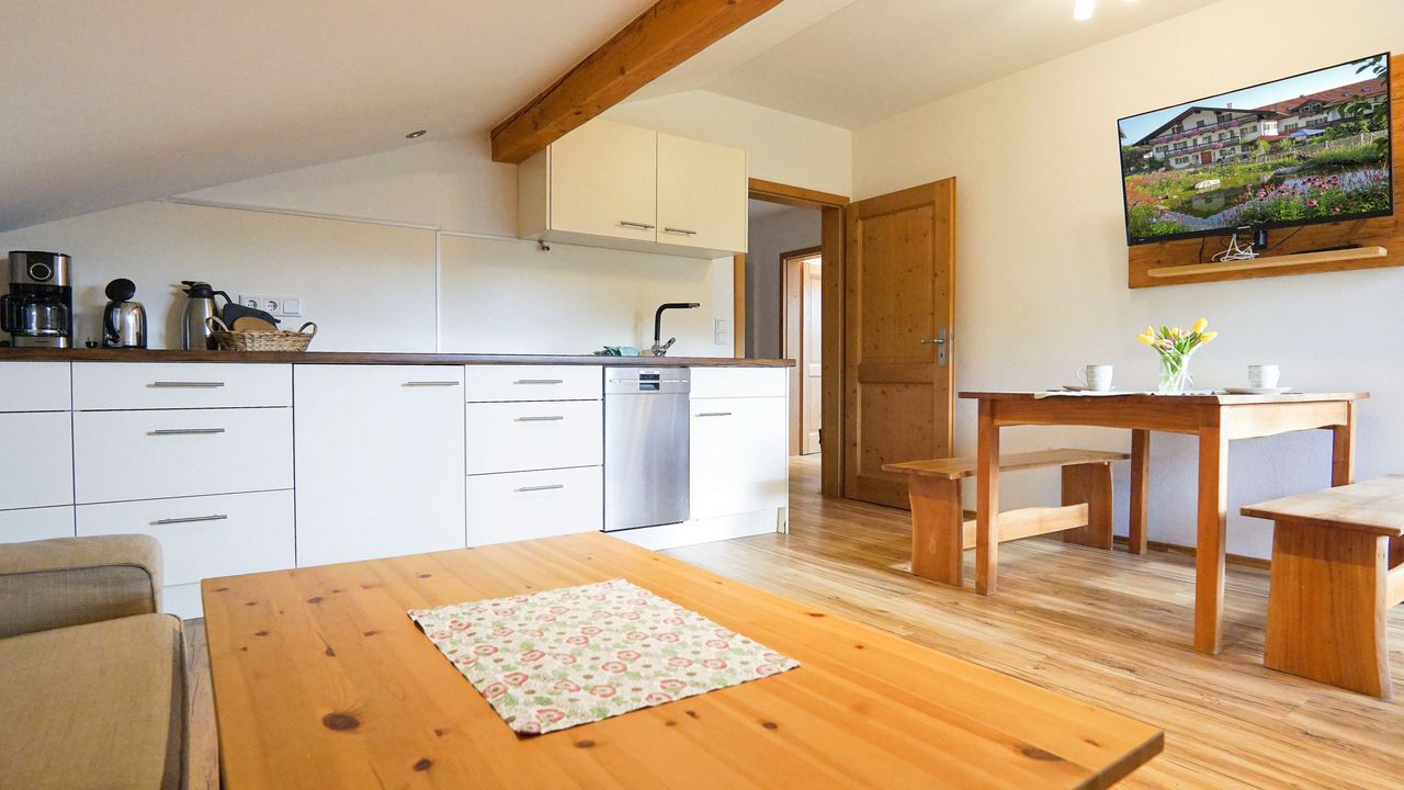 Wohnbereich mit Küche Wohnbereich mit Küche